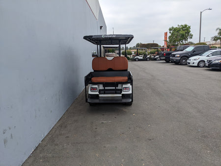 Rear view of a golf cart featuring the CRUISE-C40-SB-COMBO CRUISE CAR/ICON C40 HEAVY-DUTY SEAT BACK COMBINATION SEAT/DECK KIT with custom fabrication for golf carts.