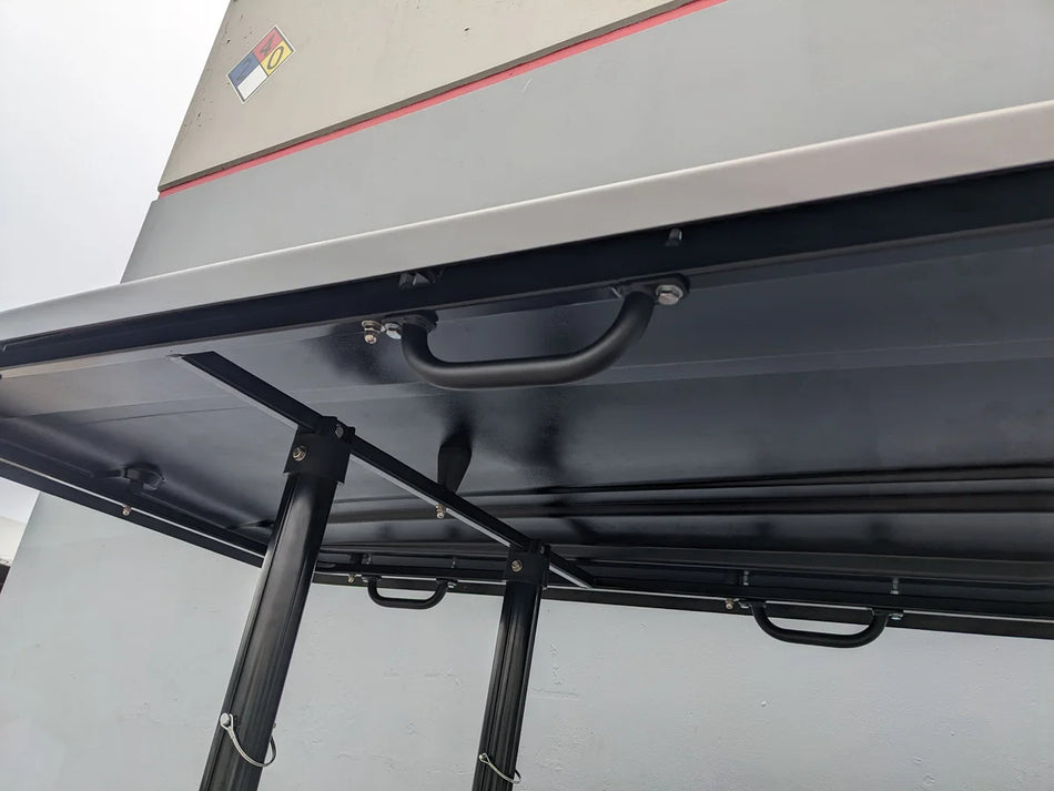 GRAB HANDLE 7″ multi-purpose heavy-duty bolt-on handle mounted under a golf cart roof, featuring custom fabrication designed for golf carts with sturdy metal construction.