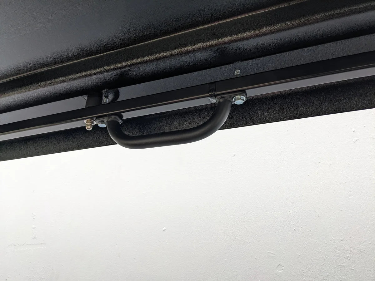 GRAB HANDLE 7″ multi-purpose heavy-duty bolt-on handle mounted inside a golf cart custom fabricated for secure grip and support during transport or utility use.
