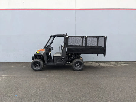 Utility vehicle with a flatbed featuring the FB-POL-PROXD-54X76X11-DUMP TILT BED ACTUATOR WITH KEY FOB REMOTE, designed for custom fabrication for golf carts and cargo hauling applications.
