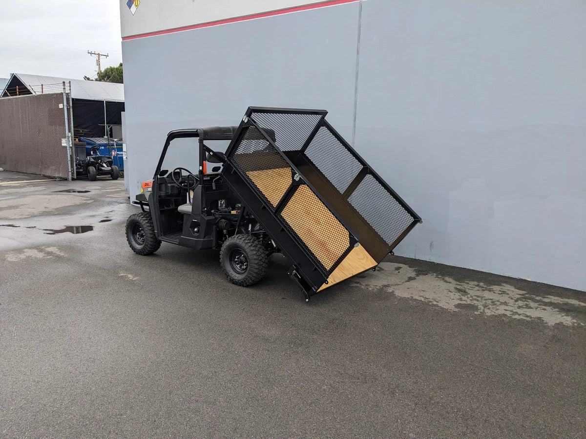 Utility vehicle equipped with a custom fabricated flatbed lifting mechanism using the FB-POL-PROXD-54X76X11-DUMP TILT BED ACTUATOR WITH KEY FOB REMOTE, designed for specialty golf cart beds and cargo transport.