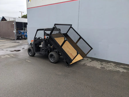 Utility vehicle equipped with a custom fabricated flatbed lifting mechanism using the FB-POL-PROXD-54X76X11-DUMP TILT BED ACTUATOR WITH KEY FOB REMOTE, designed for specialty golf cart beds and cargo transport.