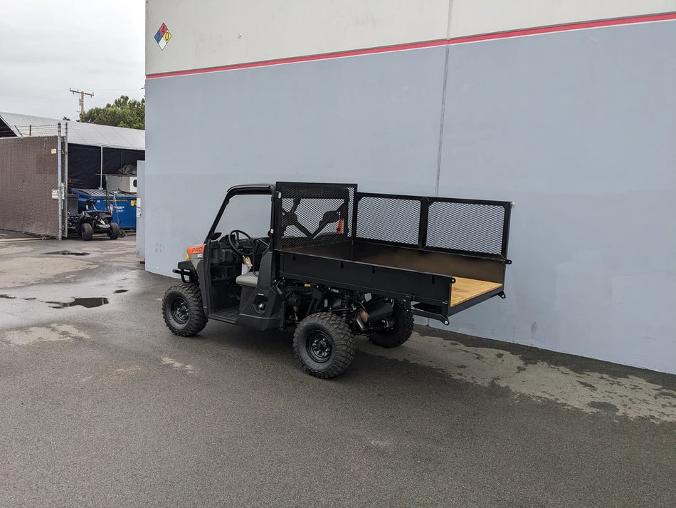 Utility golf cart equipped with FB-POL-PROXD-54X76X11-STAKE-OCB POLARIS STAKEBED RETROFIT featuring a custom flatbed with mesh side panels designed for cargo and utility hauling.