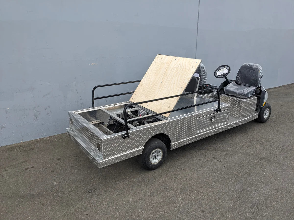 YAM-AMB-2SEAT-REAREMT-96X23 AMBULANCE CART with custom fabrication for golf carts featuring a flatbed design, metal frame rails, and two seats for utility and transport purposes.