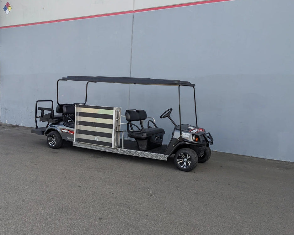 Golf cart with custom fabrications designed for CUSH-WHEELCHAIR-TRANSPORT CUSHMAN GOLF CART CONVERSIONS FOR WHEELCHAIR PASSENGER, featuring wheelchair transport and seating modifications.