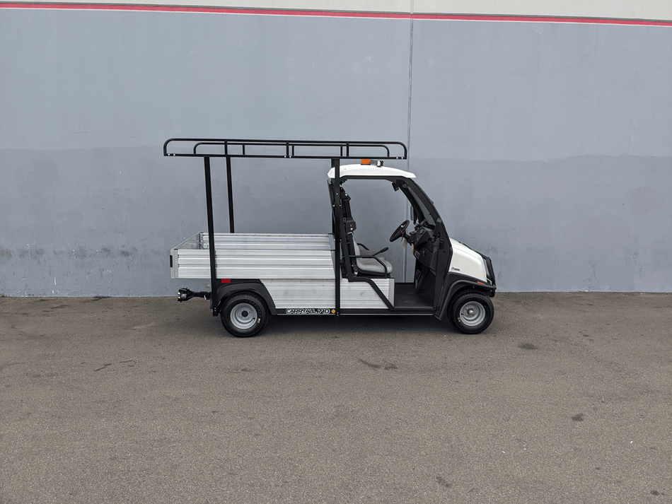 White utility golf cart equipped with a black steel ladder rack and cab guard, featuring the CC-710-50X96-CHASSIS-TLRA-GUARD CLUB CAR 710 TOP LADDER RACK AND CAB GUARD for cargo and utility transport.