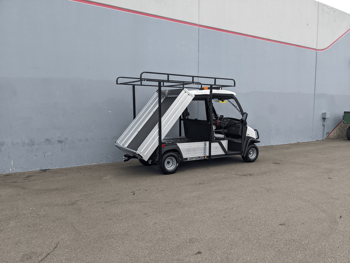 Utility golf cart equipped with CC-710-50X96-CHASSIS-TLRA-GUARD CLUB CAR 710 TOP LADDER RACK AND CAB GUARD, featuring black metal frame and aluminum flatbed side panels.