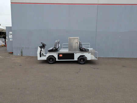 White flatbed cart with three-seat ambulance conversion and metal storage box, customized for Cushman Titan, designed for utility and specialty golf cart use.