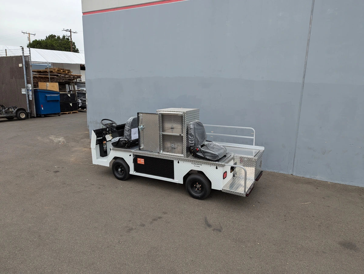 CUSH-TITAN-3SEAT-84X23 Ambulance Conversion for Cushman Titan with custom fabrication, featuring utility boxes and flatbed areas designed for specialty golf cart needs.