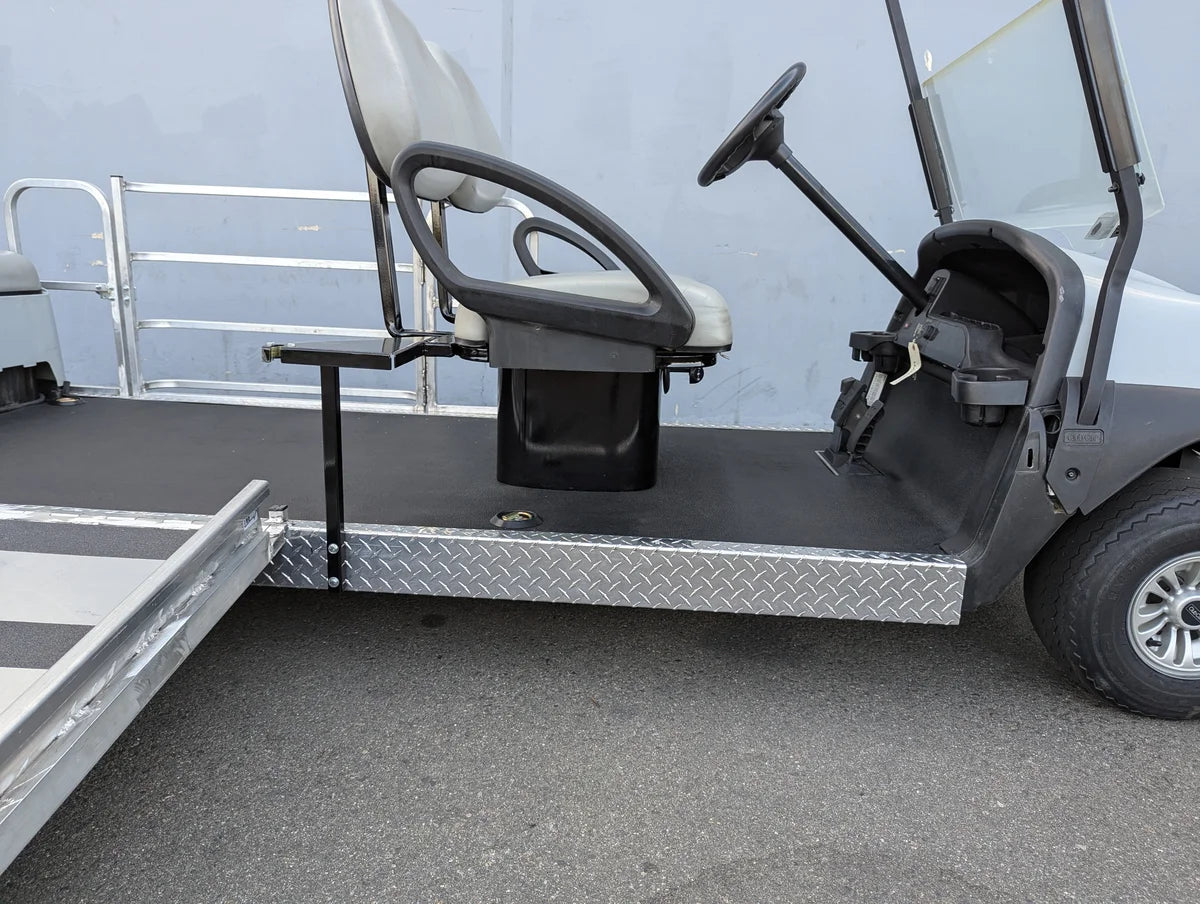 SEAT-POD-CC Heavy-Duty Club Car Seat Pod installed on a golf cart, featuring custom fabrication with diamond plate metal and a reinforced seating area for durability and utility.