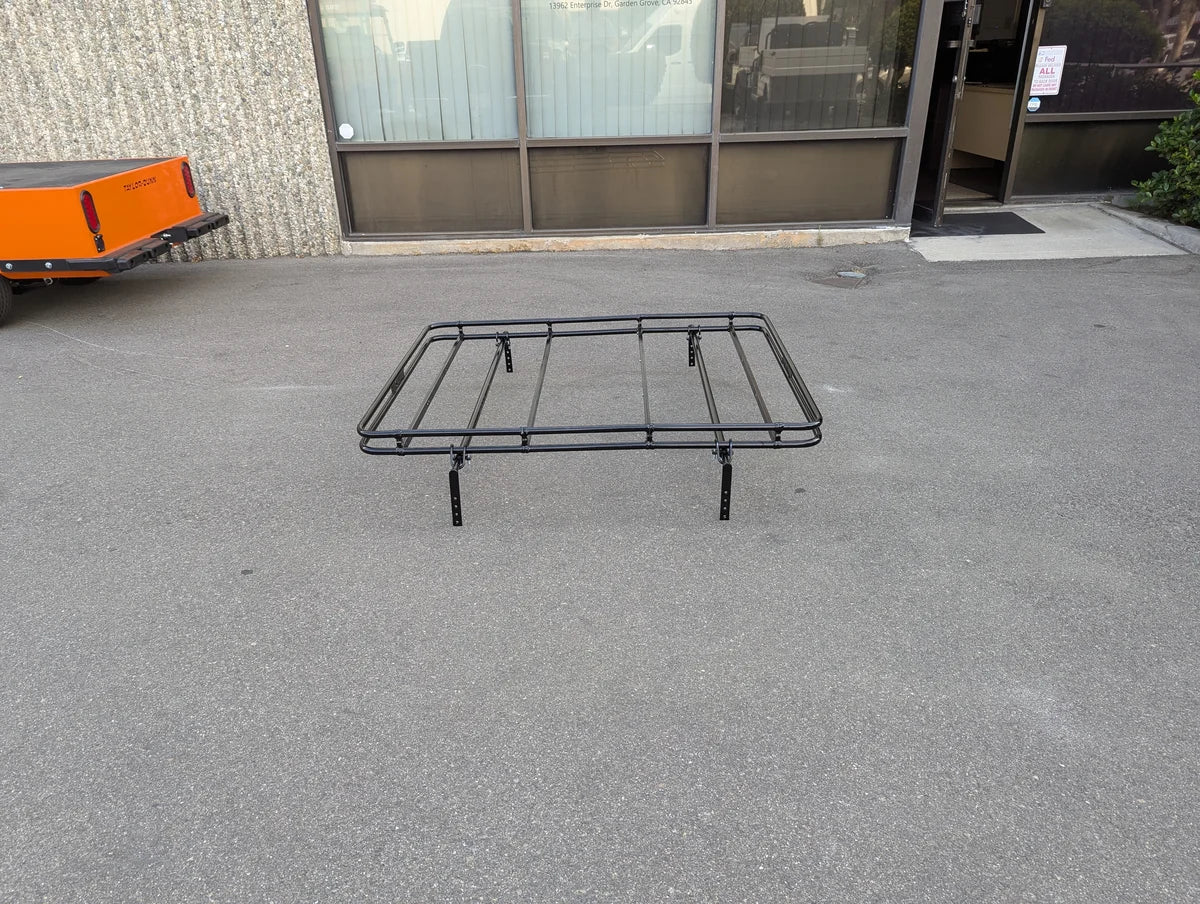 Black metal roof rack designed for custom fabrication on golf carts, featuring sturdy tubular construction, identified as MRR-43X54-RR3 Heavy-Duty Golf Cart Roof Rack will fit most golf carts.