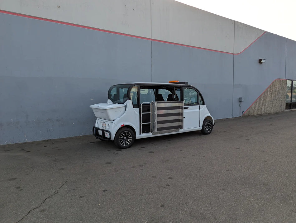 GEM-E6 WHEELCHAIR TRANSPORT GEM GOLF CART CONVERSION FOR WHEELCHAIR PASSENGER showing custom fabrication for golf carts with accessible side entry and safety features for wheelchair transport.