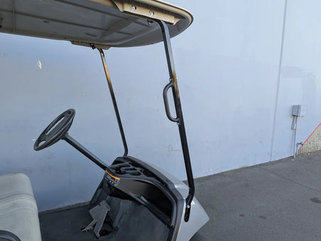 GRAB HANDLE 7″ multi-purpose heavy-duty bolt-on handle mounted on a golf cart frame, showcasing custom fabrication for golf carts with durable black metal construction.
