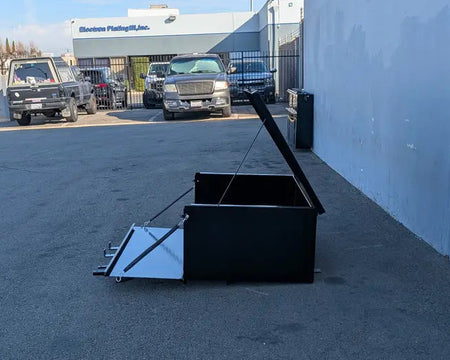 Black CC-PREC-CARGO31 LOCKING CARGO BOX FOR CLUB CAR PRECEDENT with open lid and ramp, custom fabrication designed for golf carts, displayed outdoors near vehicles.