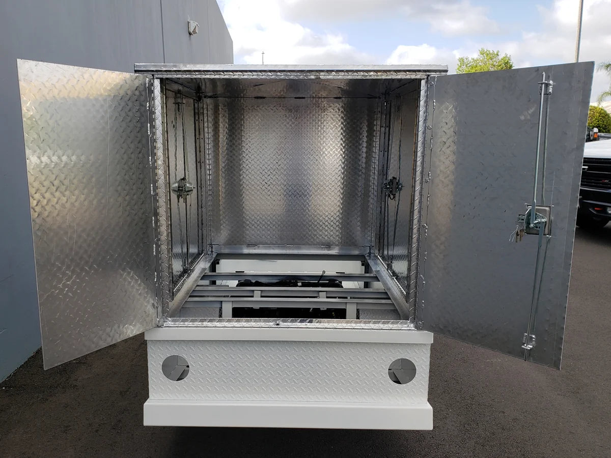 Open rear view of the FMB-44X72X48-D-D3W3 FLATBED ALUMINUM DIAMOND PLATE MULTI-PURPOSE BOX 44″ WIDE X 72″ LONG X 48″ TALL WITH LOCKING DOORS ON REAR, LEFT AND RIGHT SIDE showing custom fabrication for golf carts.